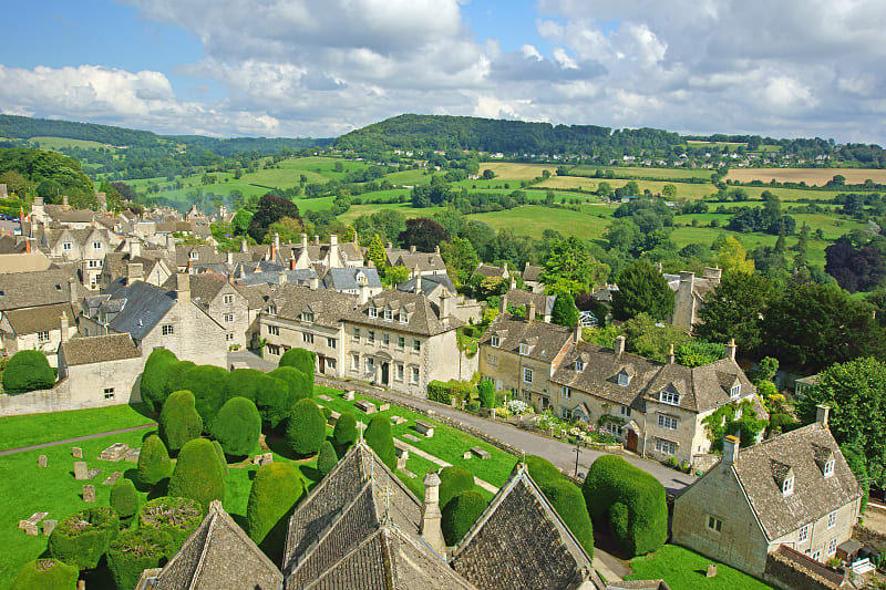View of the village Painswick and surrounding countryside in the Cotswolds View of the village Painswick and surrounding countryside in the Cotswolds