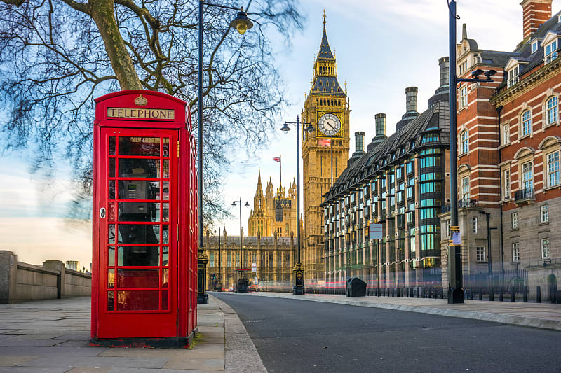 Classic red telephone box with Big Ben in London, England Classic red telephone box with Big Ben in London, England
