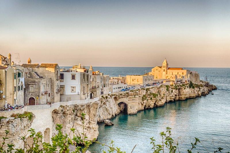 Beach town in Vieste, Italy on a sea cliff