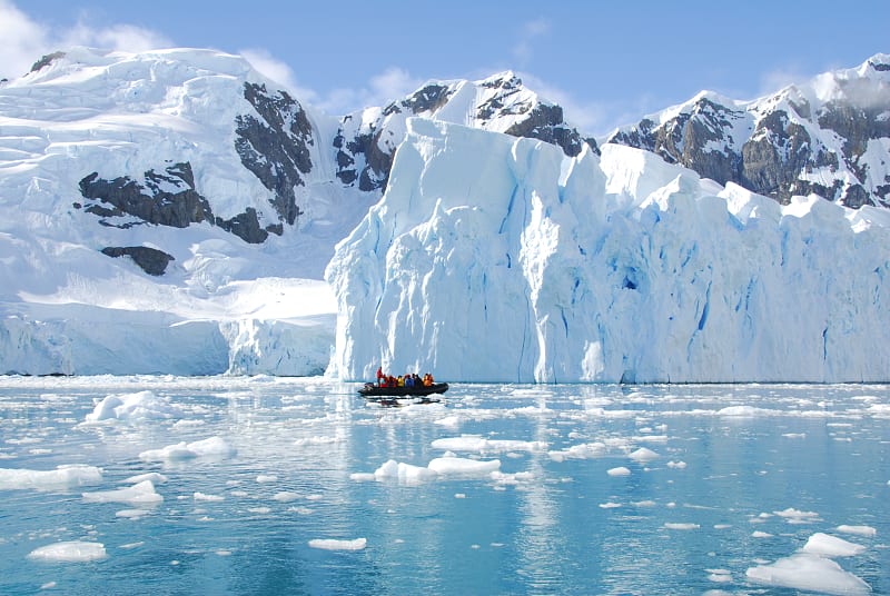 Exploring iceberg off the coast of Antarctica