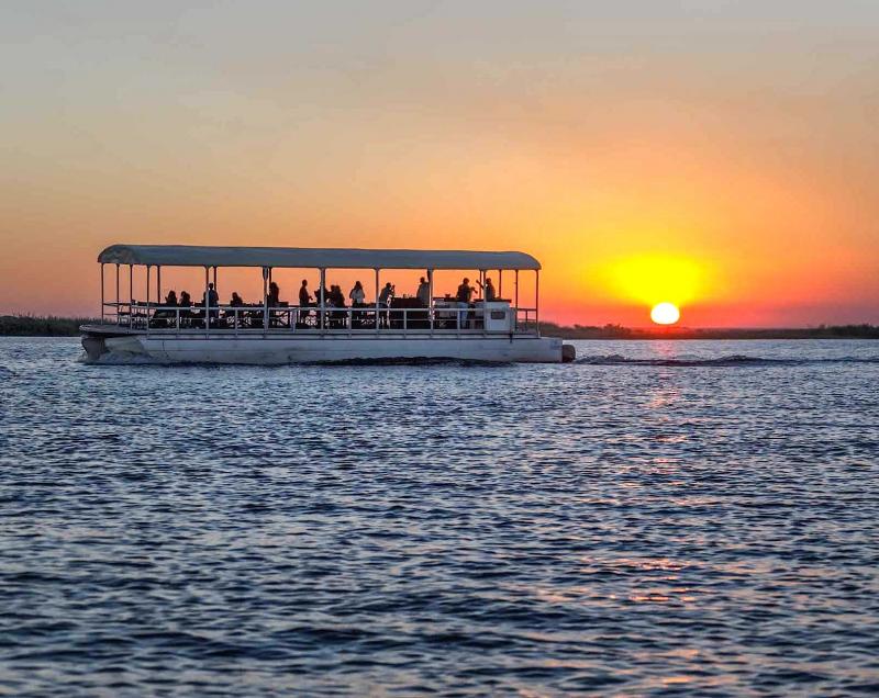 Safari cruise on the river at sunset in Chobe National Park, Botswana