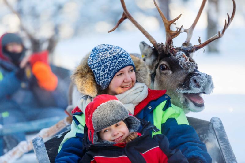 Family on reindeer safari.