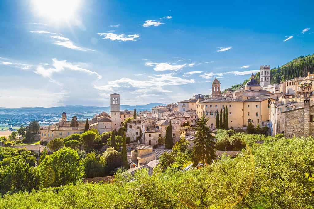 The sun rises on the historic town of Assisi in Umbria. The sun rises on the historic town of Assisi in Umbria.